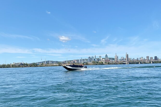 2-Hour Private Montreal Boat Cruise - Jacques Cartier Bridge to Old Port: city lights and skyline at water level