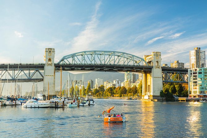 3 hours Private Vancouver Tour-from YVR Airport or Cruise Port - Stanley Park in one shot: Totem Poles, Nine O’Clock Gun, and ocean icons