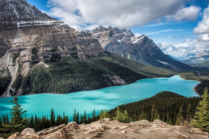 5 Day Canadian Rockies, Banff, Lake Louise, Moraine Lake, Jasper - Banff Day: Hoodoos, Bow Falls, Surprise Corner, and Johnston Canyon