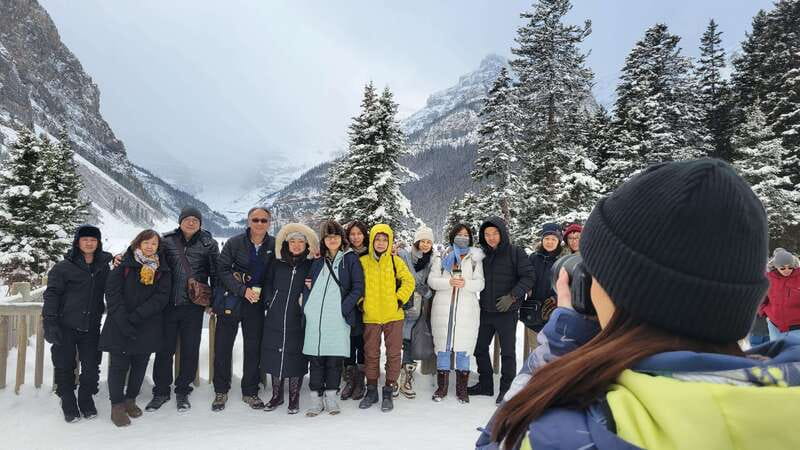 Airport Pickup & Private Tour from Calgary to The Rockies! - Bow Falls viewpoint: a waterfall stop that keeps the momentum