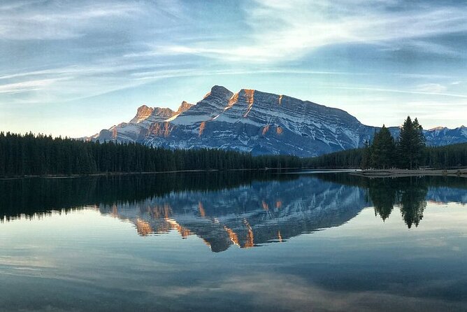 Banff Gondola Hot Springs Bow Falls and Three Lakes tour - Lake Minnewanka: Boating, Trails, and the Submerged Settlement Story