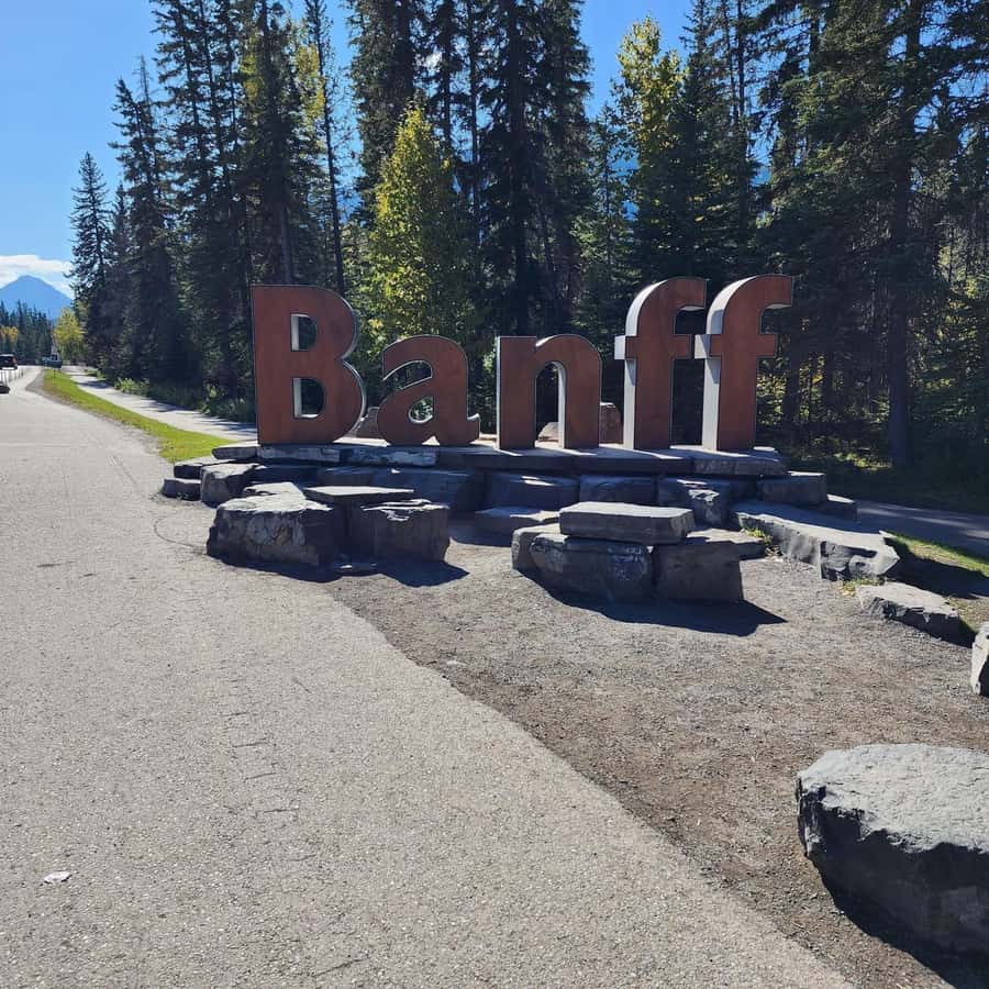 Banff: Gondola, Hot Springs, Bow falls & Three lakes tour - Bow Falls and Surprise Corner Viewpoint: classic Banff framing