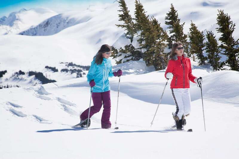 Banff National Park: Sunshine Meadows Snowshoeing Experience - Stepping into Banff National Park snow, with a guide to read the terrain
