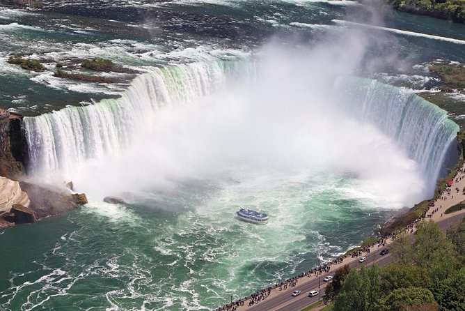 Best Niagara Falls Tour with Boat, Lunch & Journey Behind Falls - The Hornblower cruise: April to November, mist included