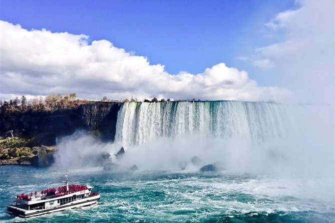 Best Niagara Falls Tour with Boat, Lunch & Journey Behind Falls - Niagara Parkway quick hits: Floral Clock, Old Scow, Whirlpool, and Goat Island