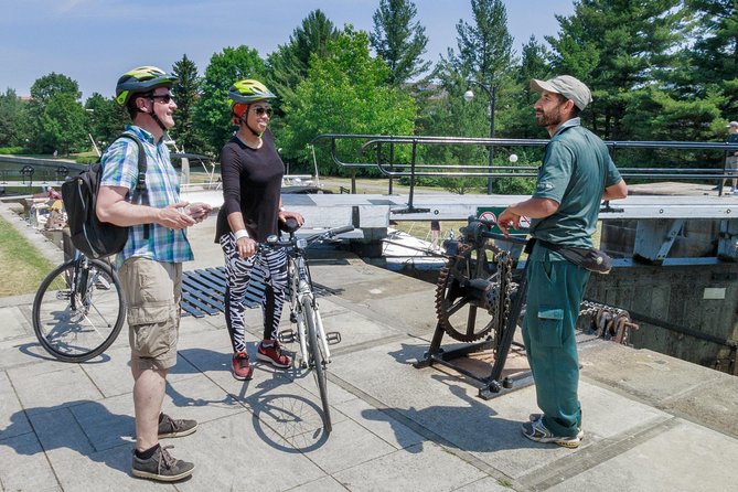 Best of Ottawa Neighbourhoods & Nature Bike Tour - Remic Rapids Park: Rock Sculptures and a Chat With the Artist