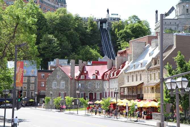 Best of Quebec City: Panoramic Bus Tour with Local Guide - Old Quebec First: Place Royale and Quartier Petit Champlain in Bite-Sized Time