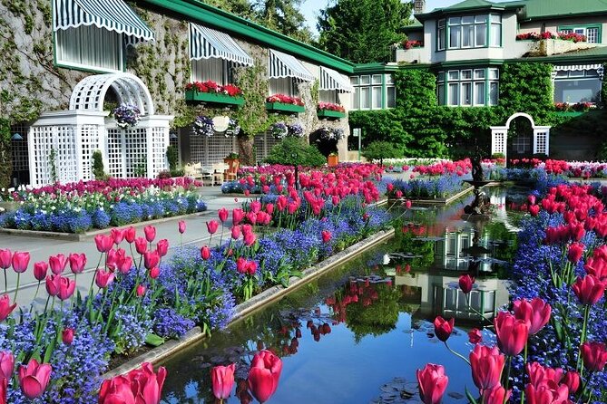 Best of Victoria and Butchart Gardens Day Tour from Vancouver - Victoria Inner Harbour: Mile O, Ogden Point, Empress Area, Chinatown, and Fan Tan Alley