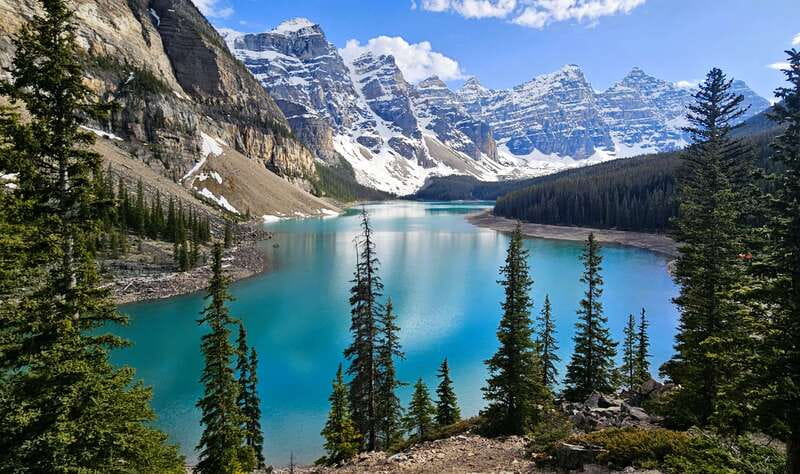 Calgary: Glaciers, Mountains, Lakes, Canmore and Banff Tour - Canmore first: a real town break, lunch to go, and a chance at wildlife