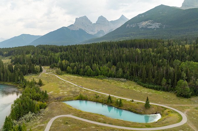 Canmore’s #1 Food Bike Tour: A Must Do Mountain Experience! - Three Sisters views: your mountain landmark moment