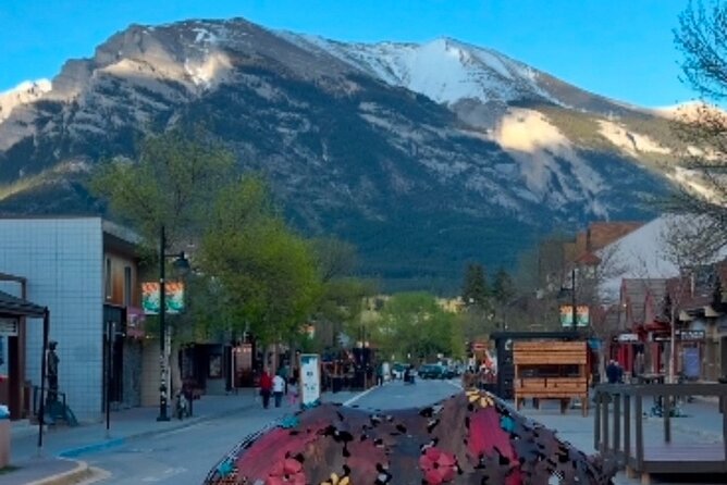 Canmore Town Walking Tour with Refreshment and Sweet Treat - Where the walk starts: the Big Head sculpture in Canmore