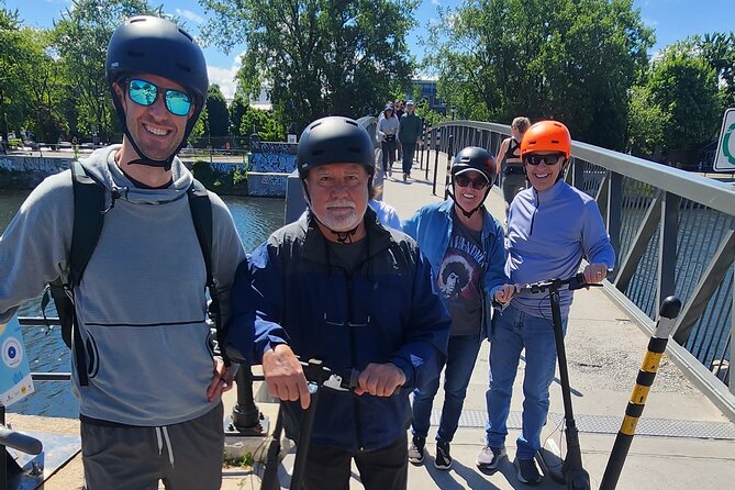 Experience Old Montreal on e-scooters with a local comedian - Meeting at 809 Rue William and getting comfortable fast