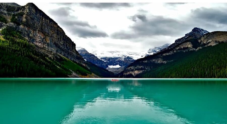 From Banff/Canmore: Moraine Lake, Lake Louise 1.5 hrs Each - Moraine Lake stop: turquoise water, towering peaks, and time for a shoreline view