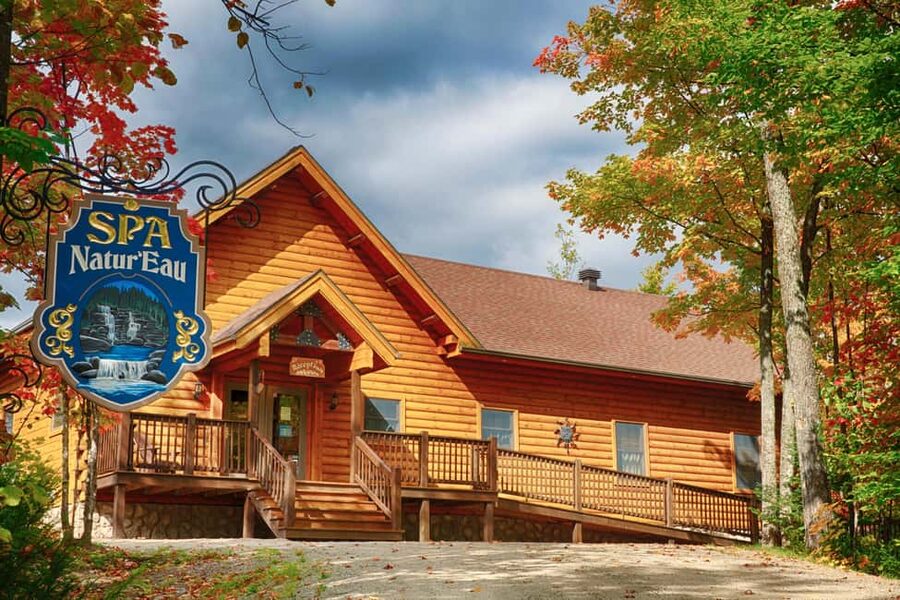 From Montreal: Natur'Eau Spa Day Trip with Admission Ticket - Outdoor circuit: hot whirlpools, Nordic bath with waterfall, and that fireplace pause