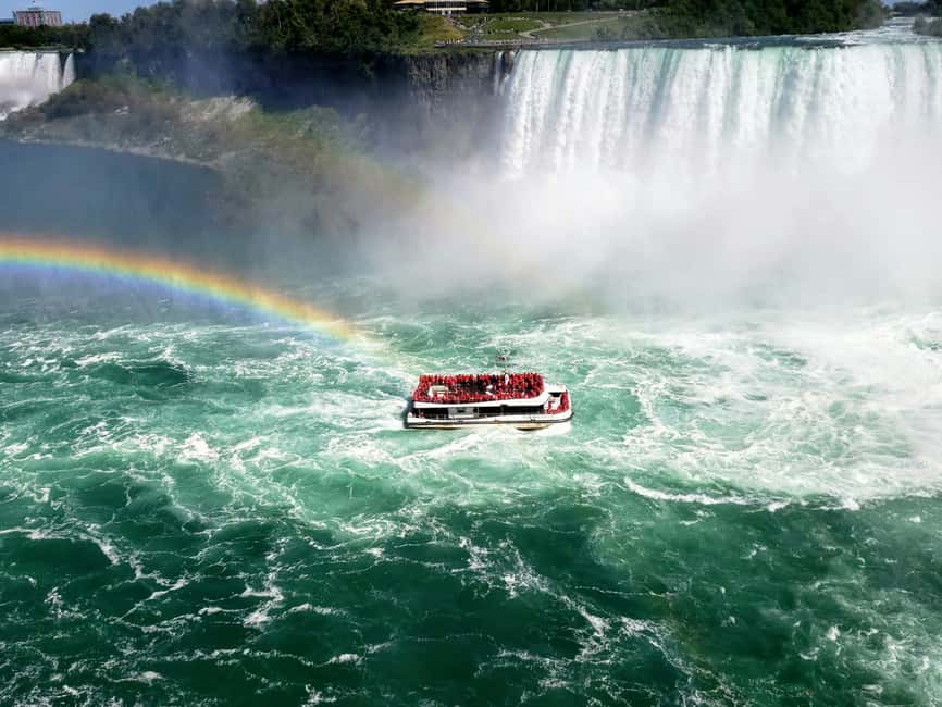 From Toronto: Niagara Falls Guided Day Tour with Boat Cruise - Pickup and the Niagara River drive you can feel