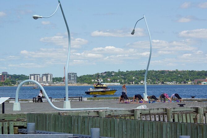 Halifax Boardwalk & Seaport: a Smartphone Audio Walking Tour - Statues that teach: Samuel Cunard and the Emigrant figure