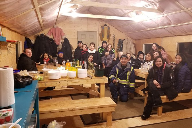 Intimate Aurora Tours Cozy Cabin Bucket List - Photo fun with fur coats and photo guidance