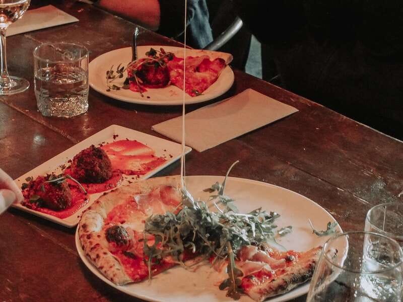 Kelowna: Walking Food Tour with 7 Tastings and 4 Drinks - Kasugai Gardens, Dolphins Kelowna, and public art you can’t ignore