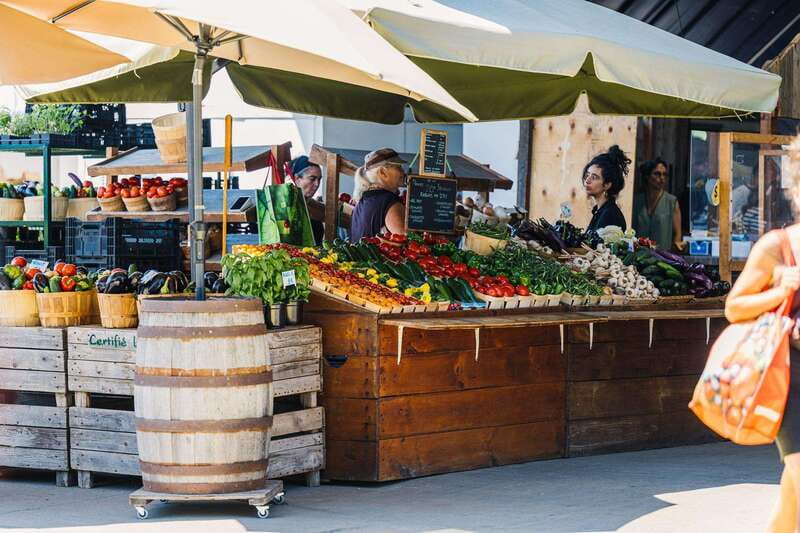 Montreal: Jean-Talon Market & Beyond Locally Owned Food Tour - Jean-Talon Market street food and vendor sampling