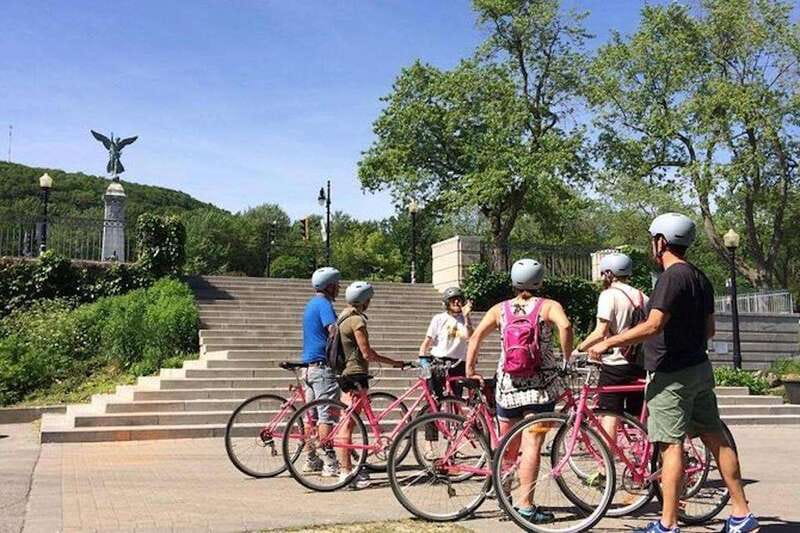 Montreal: Non Touristy Pink Bike Tour - Parks and Street Art Stops That Make You Look Up
