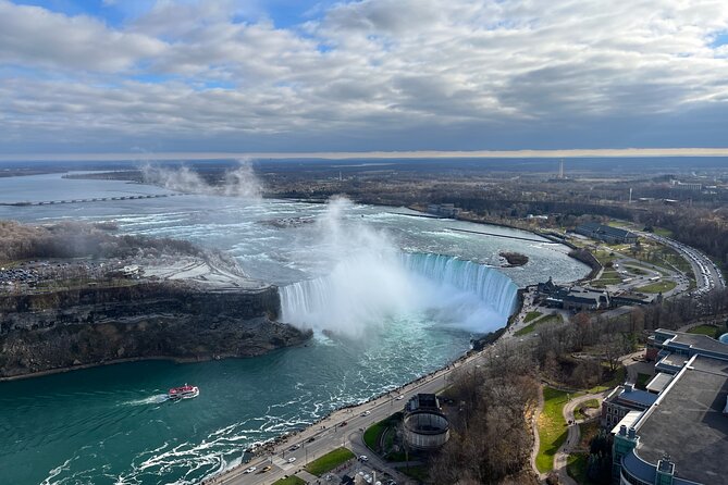 Niagara Day Trip by Micko with Cruise AND/OR Skylon! - Maple Leaf Place and the carved moose photo moment