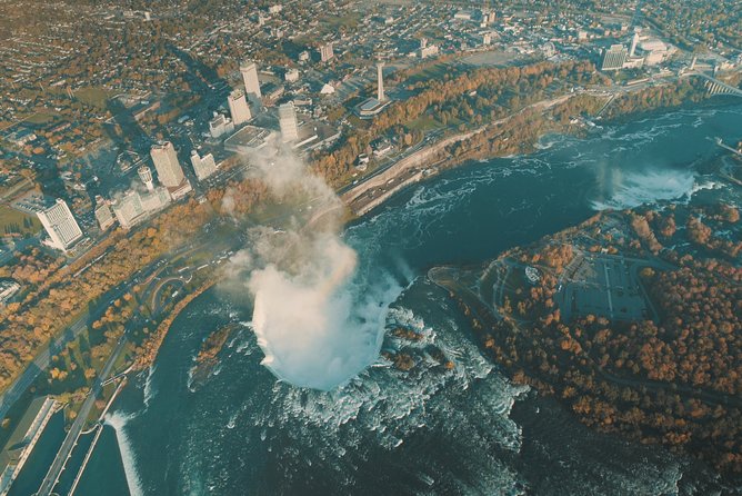 Niagara Falls Canada Tour: Helicopter, Boat, Behind Falls & Lunch - Mercedes van pickup, a guide who keeps the day moving