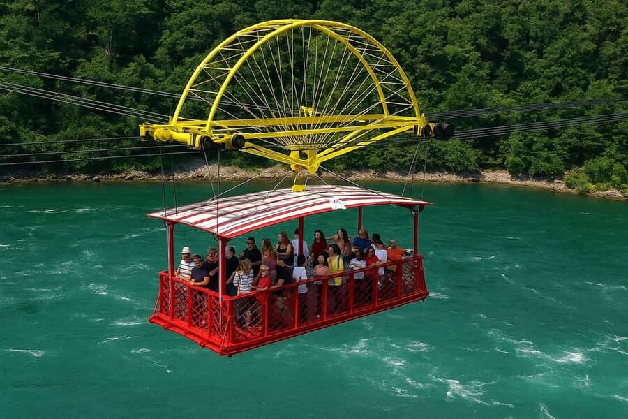 Niagara Falls, ON: Guided Tour with Boat, Skylon & Journey - Journey Behind the Falls: Tunnels Where Water Feels Close