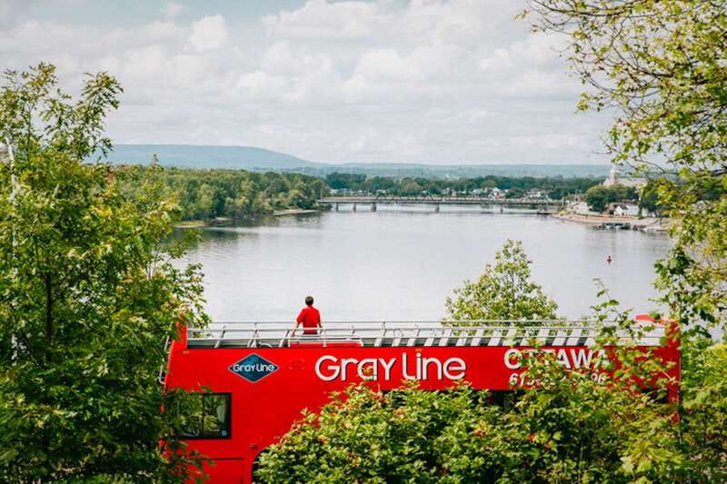Ottawa: Hop-On Hop-Off Guided City Tour Pass - The onboard guide: bilingual French and English, plus audio backups
