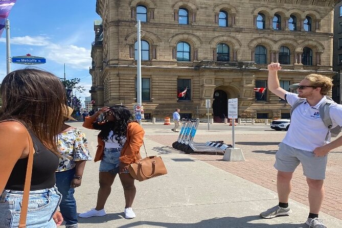 Ottawa Small Group Walking Tour with Cruise and Art Gallery - ByWard Market, with a guide telling you what to notice