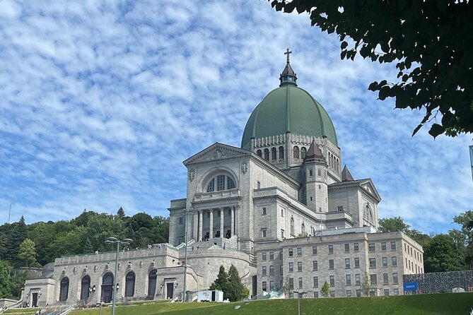 Private Montreal City Tour by Car, History & Hidden Gems - Old Port of Montreal: cobblestones, historic buildings, and a quick French foundation