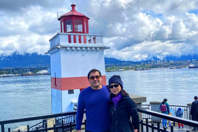 Private Vancouver ALL IN ONE Full Day City Tour with 20 Attractions - English Bay waterfront variety: sculptures, beach time, and Burrard Bridge angles