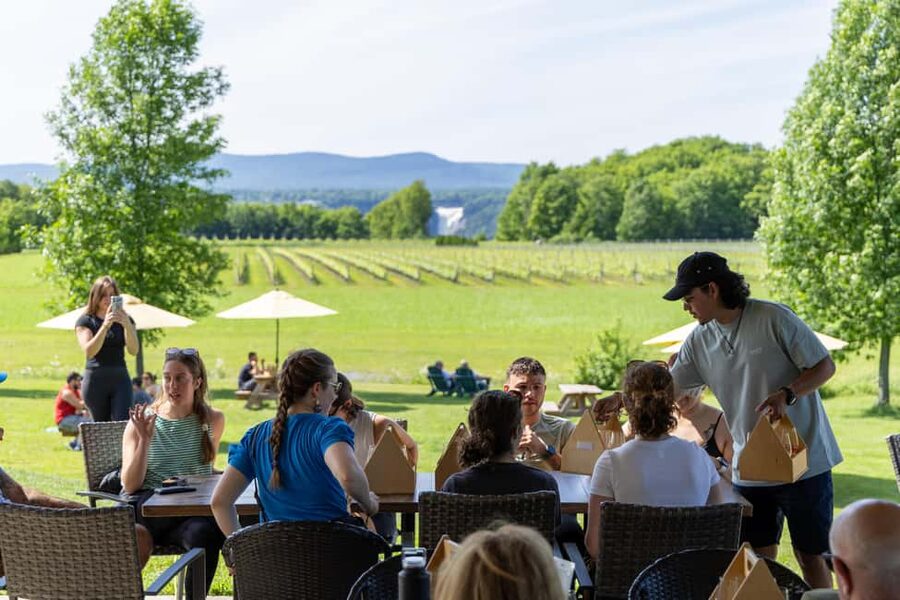 Quebec City: Ile d'Orléans Guided E-Bike Tour with Tastings - Climb Up With Assistance and Sip at a Family-Run Vineyard