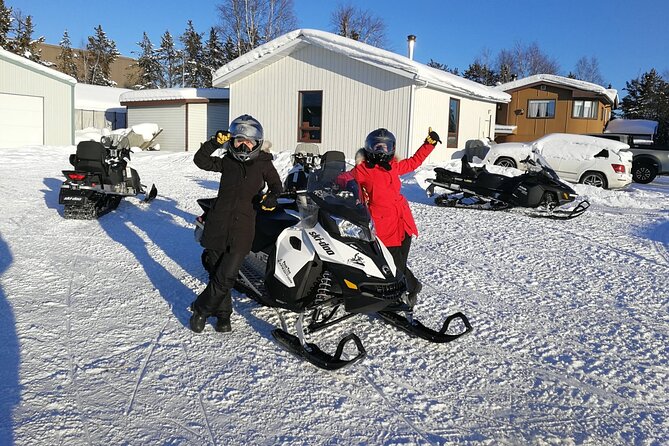 Snowmobile Tour - Trails, frozen lakes, and the kind of views that stick