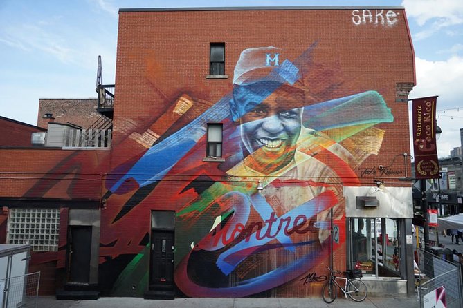 The Original Montreal Mural Arts Tour by Spade & Palacio - Stop 2: The Leonard Cohen Mural Stop (10 Minutes)