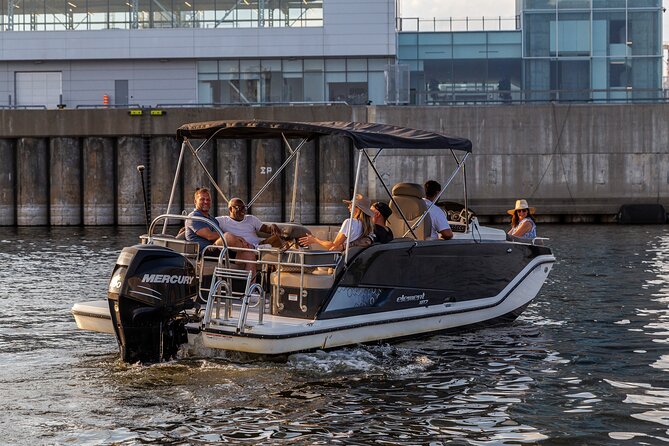 The Ultimate Montreal Boat Tour – Fall Colors Apéro Edition - Under the Victoria Jubilee Bridge, feeling the scale of the river
