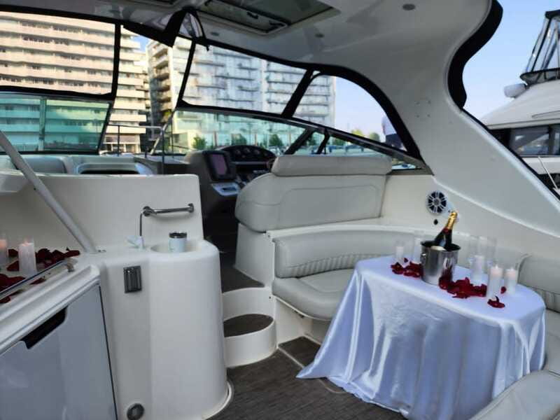 Toronto: Private Luxury Yacht Sightseeing Cruise & Prosecco - Deck life on a private yacht: interior comfort and outdoor sightlines