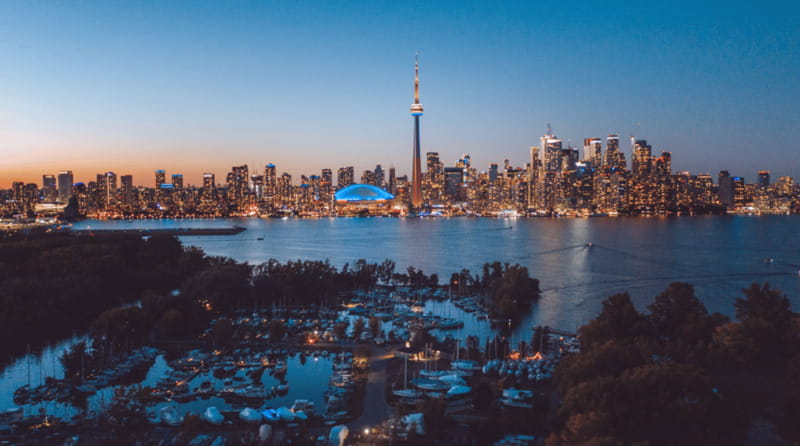 Toronto: Small Group Night Tour with Harbour Boat Cruise - Distillery District at Your Pace: Cobblestones, Shops, and Quick Bites