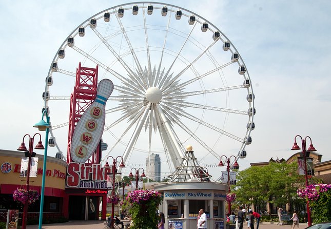 Toronto to Niagara Falls Tour with Skywheel & Fallsview Dinner - Stories on the road: canal locks, Old Scow, hydro power, and pass-bys
