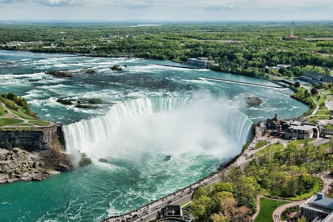Toronto to Niagara Falls Tour with Skywheel & Fallsview Dinner - Clifton Hill time, when the day turns playful