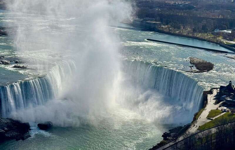 Toronto: Winter Niagara Falls Tour with Attractions Package - Riding the Niagara River in winter with live commentary