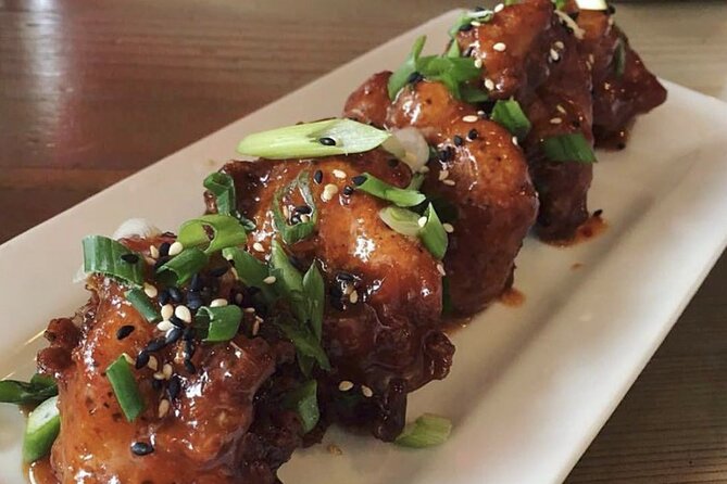 Vancouver Private Food Tour – Taste 6+ Local Dishes & Fresh Sushi - The included bites: pork sandwich, scotch eggs, taco-style chicken, sushi, and a secret dish