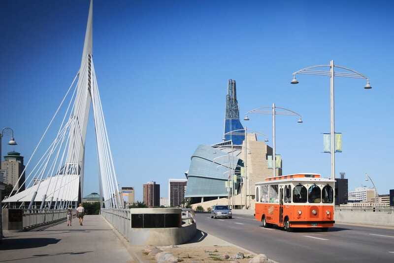 Winnipeg: 2-Hour City Trolley Tour - The Back Alley Arctic Outdoor Art Gallery: a stretch, then a photo moment